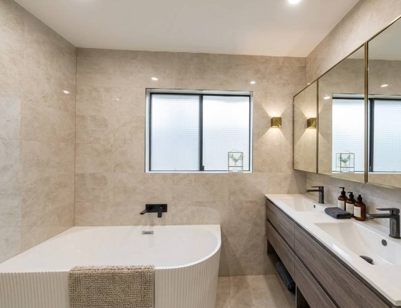 Modern minimalist bathroom with a white fluted bathtub