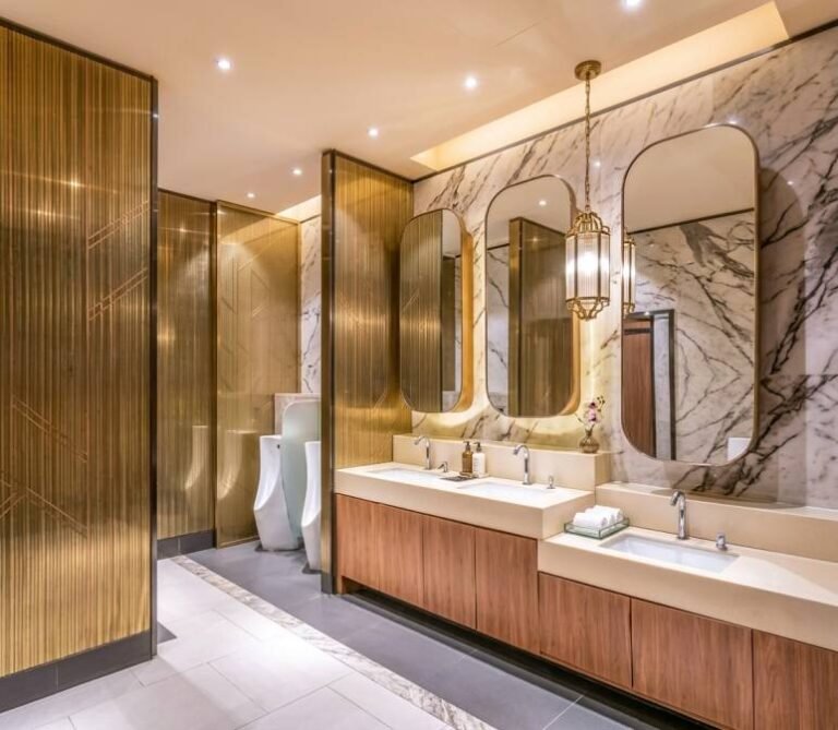 An interior view of a modern commercial bathroom